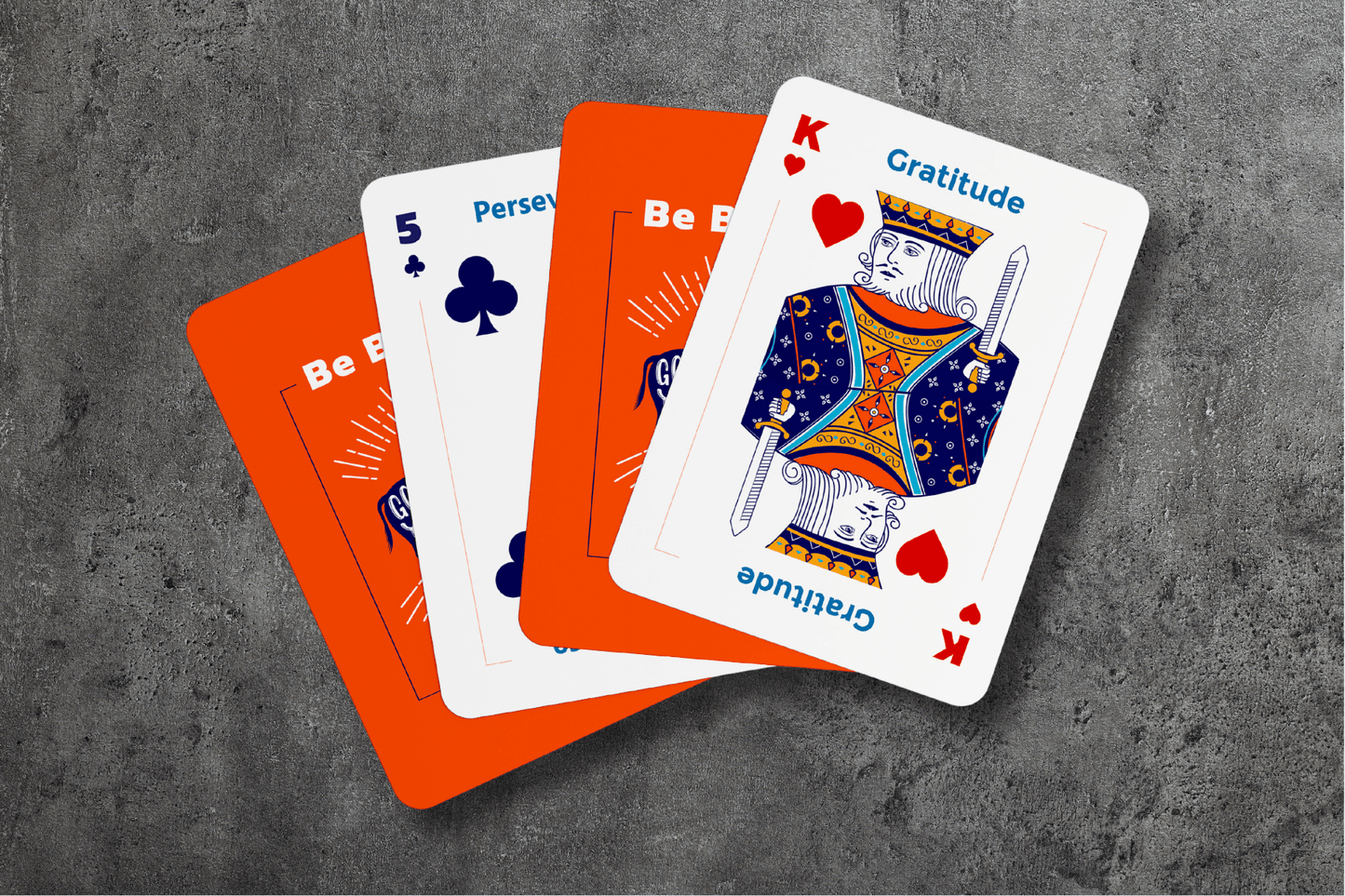 A set of 4 "Be Buffalo" cards, featuring the 5 of Clubs (Perseverance), a King of Hearts card (Gratitude), and the card back with the "Be Buffalo" design.