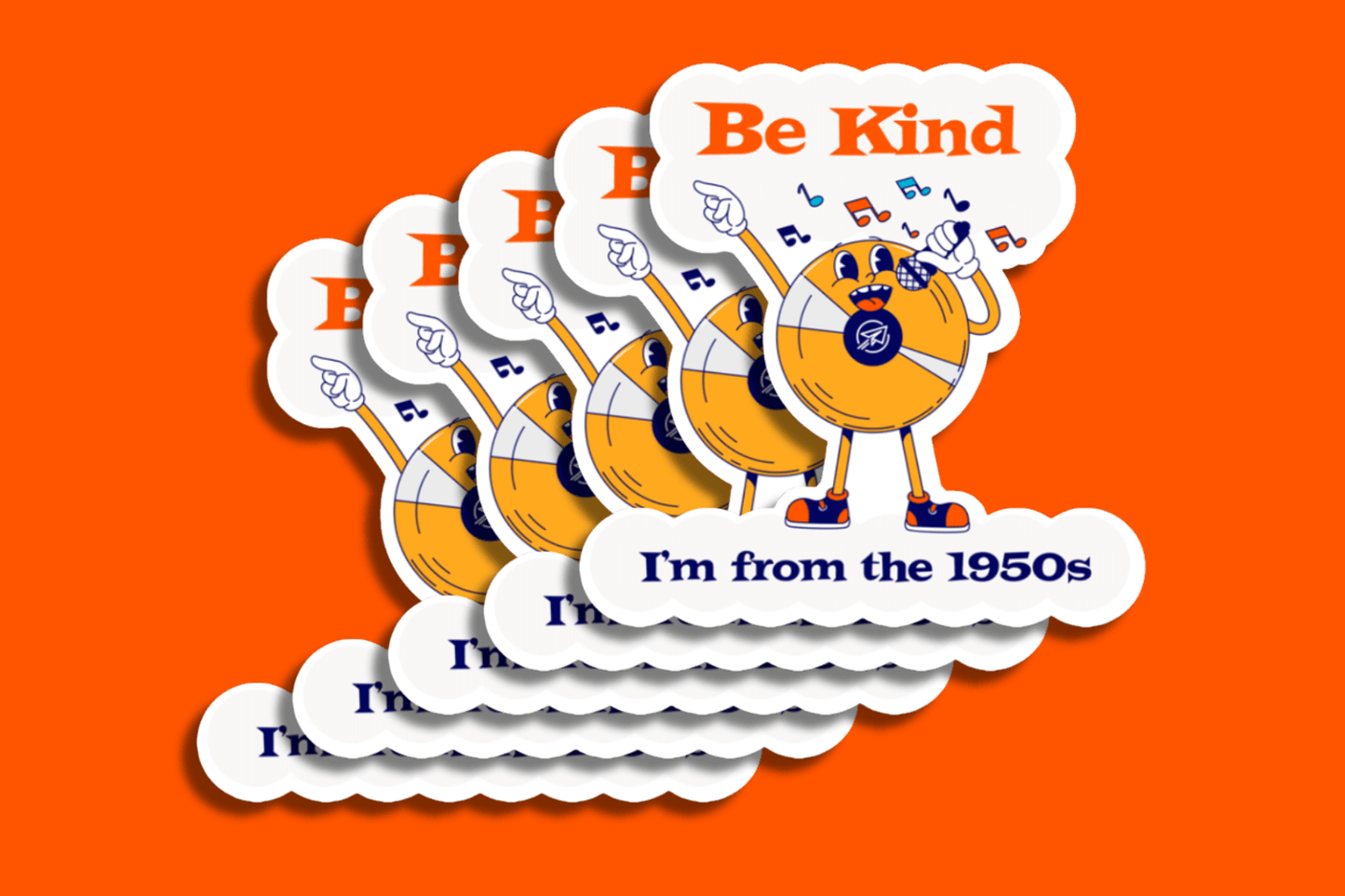 A stack of vibrant stickers is displayed against an orange background. Each sticker features a retro-style vinyl record character with arms, legs, and a joyful expression, holding a microphone and singing. Musical notes float around its head. Above the character, bold text reads “Be Kind,” and below, it says “I’m from the 1950s” in dark blue retro font. The stickers are layered in a cascading formation.
