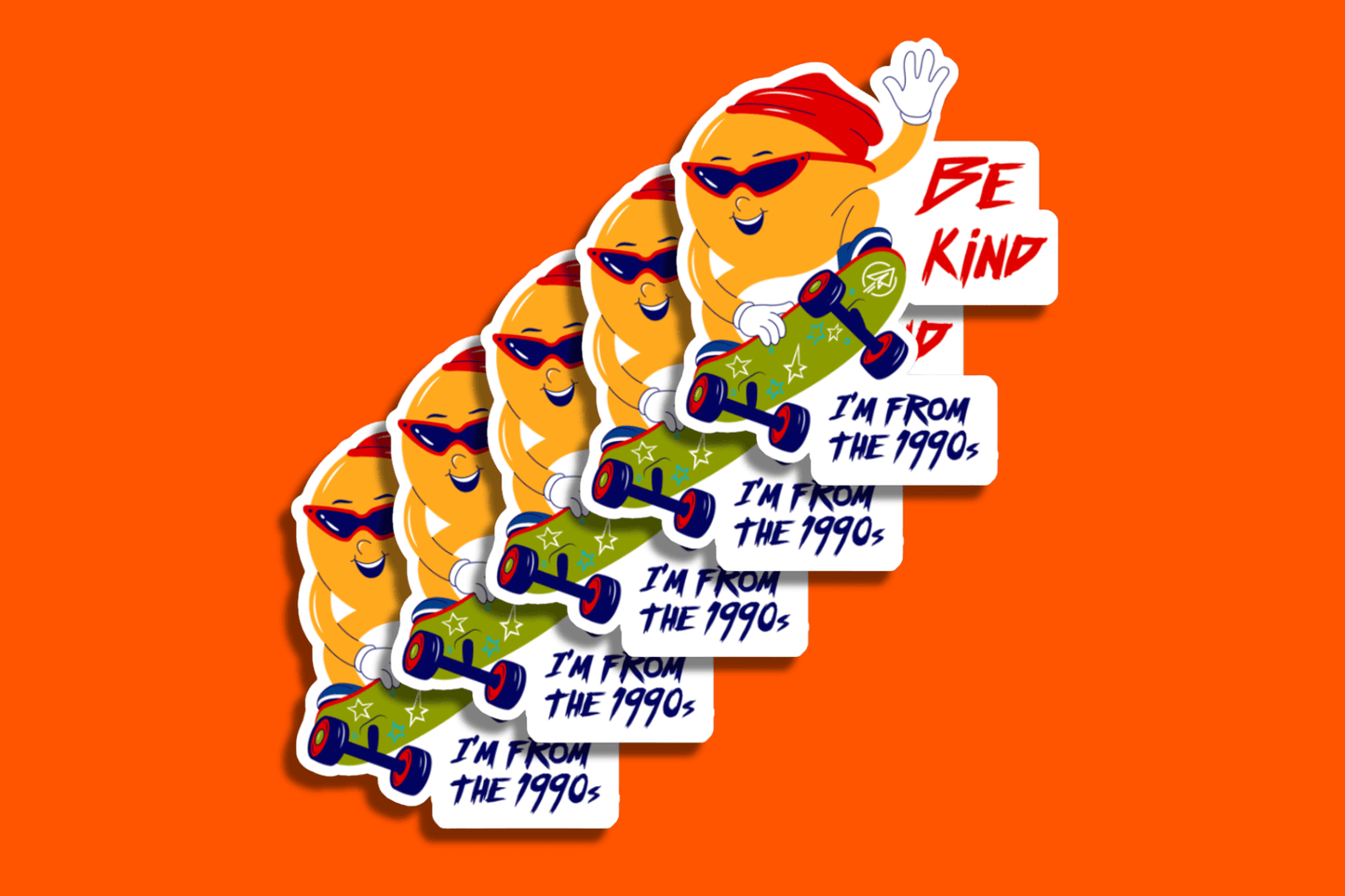 A stack of colorful stickers is arranged diagonally on an orange background. Each sticker features a playful character with a round face, sunglasses, a red beanie, and a skateboard. The character is smiling and waving. The top of the sticker reads “Be Kind,” and the bottom says “I’m from the 1990s” in bold navy font. The design evokes 1990s street style.
