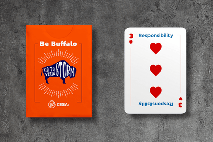 A "Be Buffalo" card deck box next to a card displaying the word "Responsibility" with three red hearts.