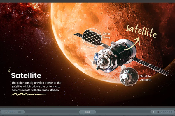 A BenQ interactive display shows an image of a satellite in space, highlighting the solar array and satellite antenna with labeled annotations explaining their functions.