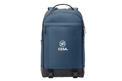 A blue backpack with a black base and straps is shown against a white background. It features a front zippered pocket with a logo that includes the CESA 6 Logo. 
