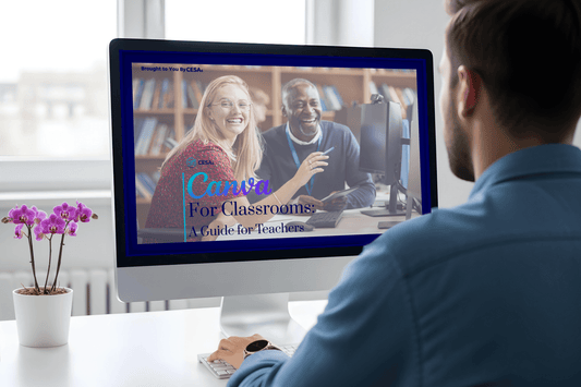 A person at a desk views a computer screen showing two smiling educators with the text “Canva for Classrooms: A Guide for Teachers” by CESA 6.