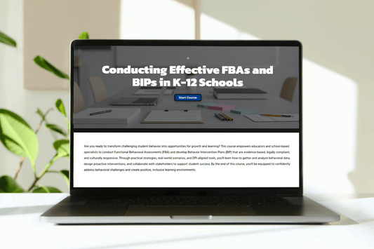 Laptop displaying a course page titled "Conducting Effective FBAs and BIPs in K-12 Schools" with pens and paper on a desk, conveying a professional, educational tone.