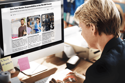 A person is at a desk, focused on a computer screen displaying the course section titled “Core Team Member Responsibilities in the FBA/BIP Process” with images of professionals.