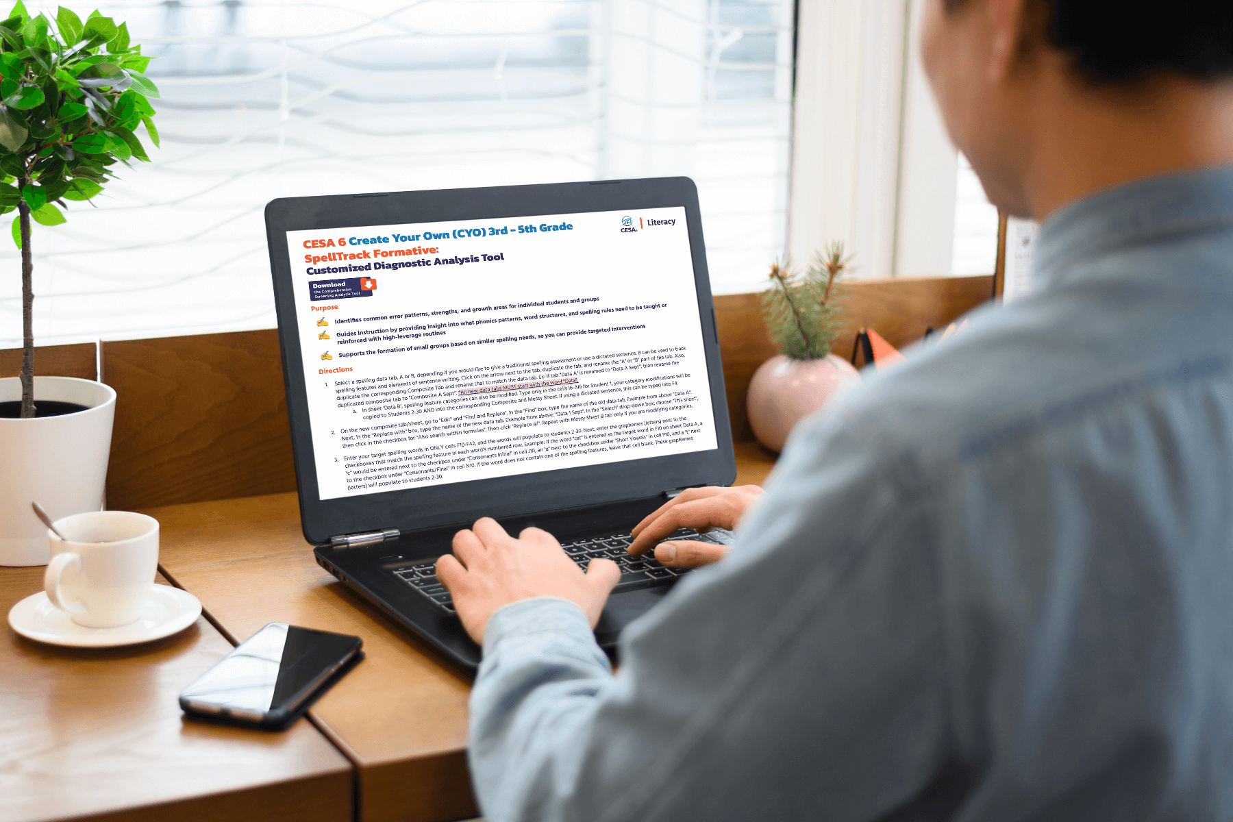 A laptop on a white table displaying a "CESA 6 Create Your Own (CYO) 3rd-5th Grade SpellTrack Formative: Customizable Diagnostic Analysis Tool" document. Bright, modern setting.