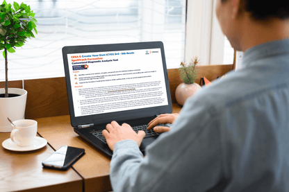 A laptop on a white table displaying a "CESA 6 Create Your Own (CYO) 3rd-5th Grade SpellTrack Formative: Customizable Diagnostic Analysis Tool" document. Bright, modern setting.