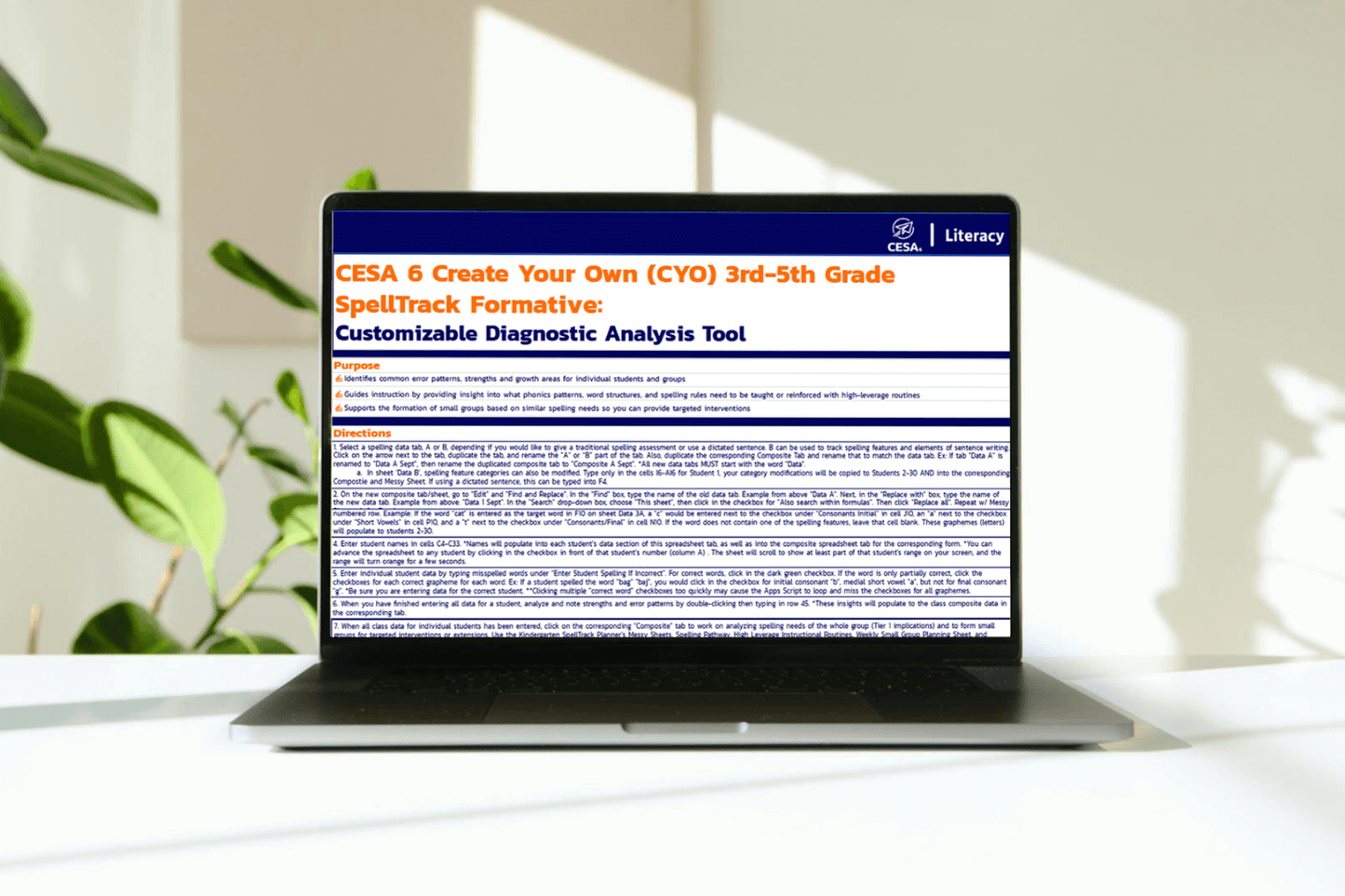 A person in a blue shirt uses a laptop at a wooden desk with plants. The screen displays an educational analysis tool. The setting feels calm and focused.