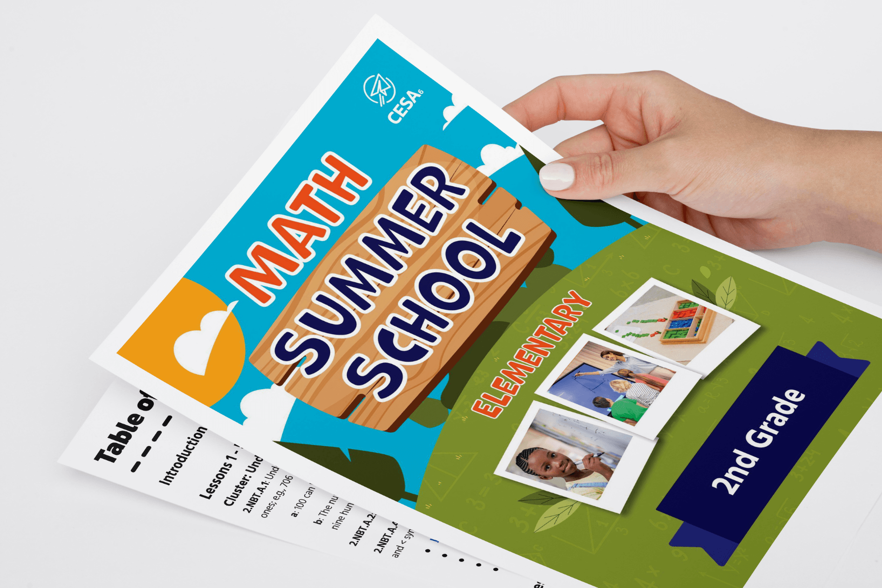 A person holds a colorful print for a "Math Summer School" program. The design includes text for elementary 2nd grade and cheerful visuals of students.