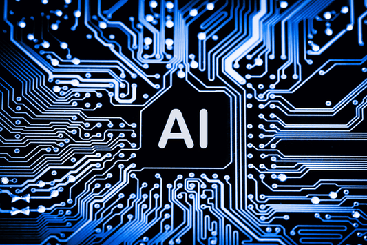 The image features a close-up view of a computer circuit board with blue traces and components, highlighting the letters "AI" in the center. The visual represents artificial intelligence, emphasizing technology and digital innovation.