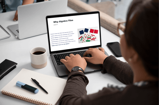 A person using a laptop with a webpage titled "Why Algebra Tiles" open, showing colorful tiles. A notebook, pen, and coffee cup are on the desk.