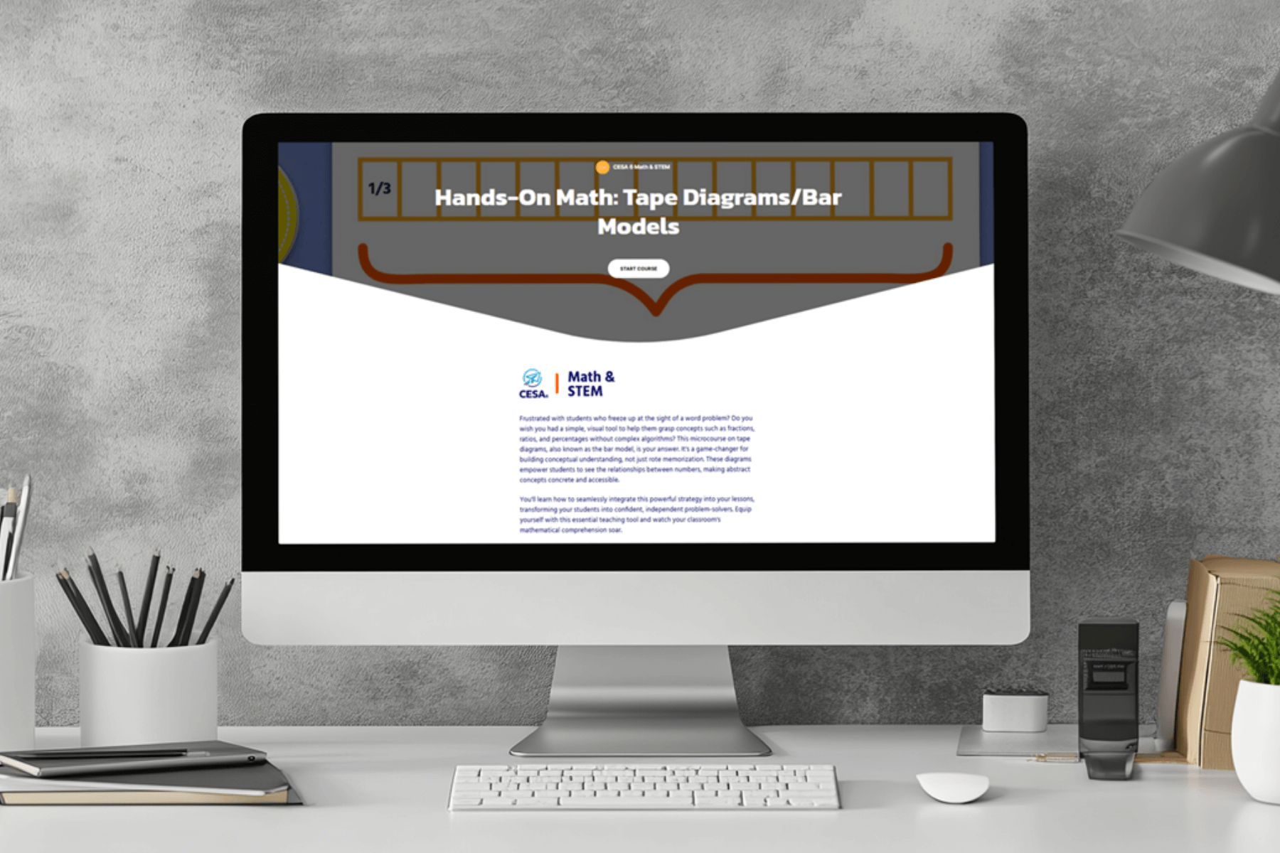 A computer screen on a desk displays an educational webpage titled "Hands-On Math: Tape Diagrams/Bar Models." The minimalist workspace includes a lamp, plant, and stationery, conveying a focused and organized atmosphere.