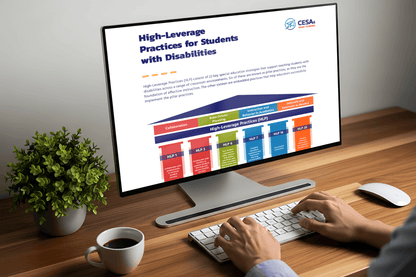 A person works on a desktop displaying "High-Leverage Practices for Students with Disabilities." A colorful chart details educational strategies. A potted plant, keyboard, mouse, and coffee cup are on the wooden desk, creating a focused, professional atmosphere.