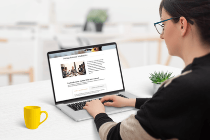 A woman with glasses works on a laptop at a white desk, showing is the section titled "Putting Protocols into Practice." A yellow mug and plant are nearby.