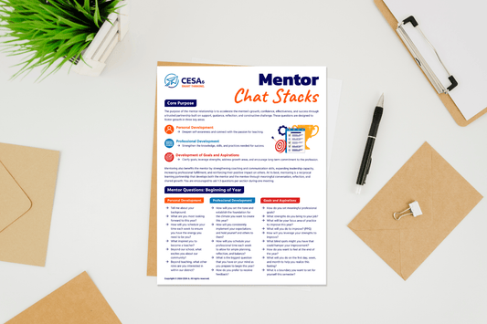 Overhead view of a “Mentor Chat Stacks” worksheet on a white desk, with a plant, pen, envelopes, paper, and clipboard creating an organized tone.