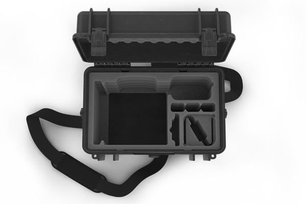 
The image shows an open Catchbox storage case with compartments designed to hold equipment, featuring a padded interior, and a shoulder strap for easy carrying.