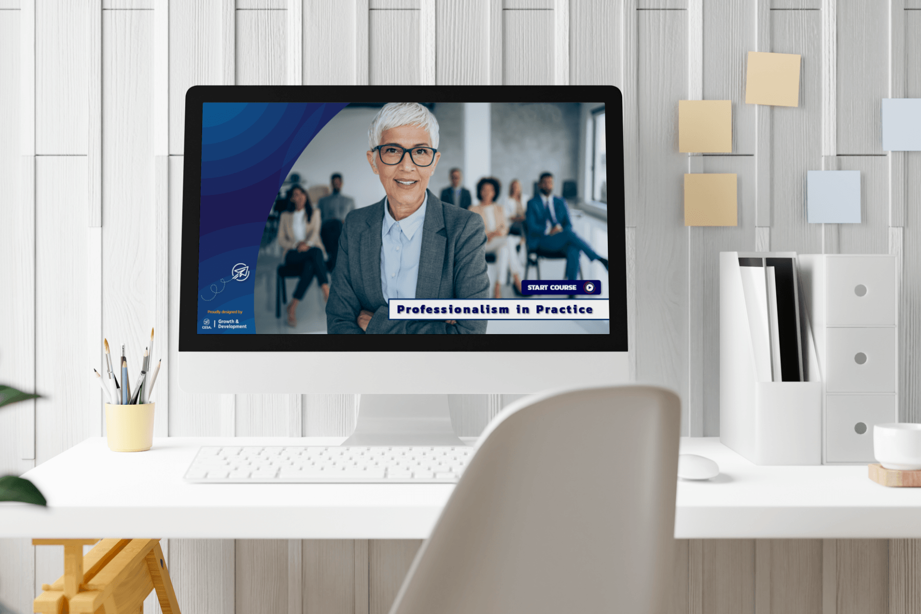A computer screen displays a course titled "Professionalism in Practice" featuring a smiling woman in glasses as the focus. Office decor in foreground.