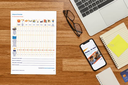 Workspace with a wooden desk featuring a printed Adapted Schedule, glasses, a laptop, notebook, and smartphone displaying "Ready Or Not?" presentation.