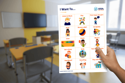 A person holds a colorful activity chart in a classroom, listing options like "Listen to Music," "Play," and "Read," surrounded by simple illustrations.
